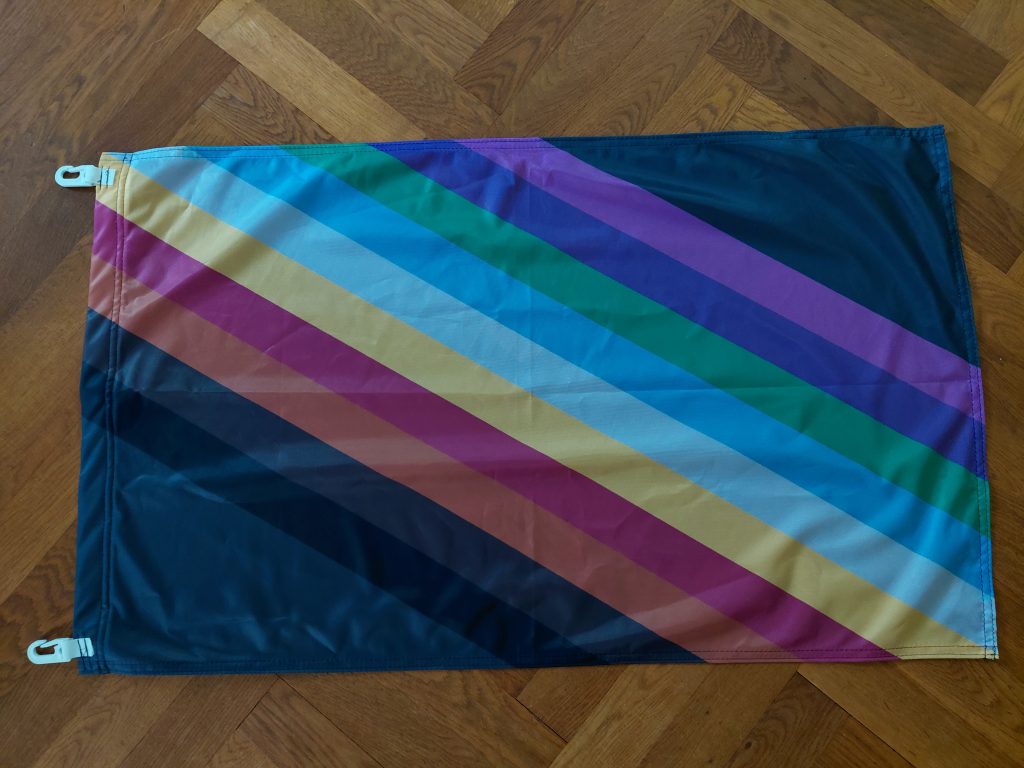 Foto einer CIMND* Pride Fahne